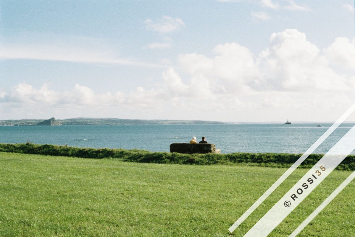 Couple on a bench by the sea